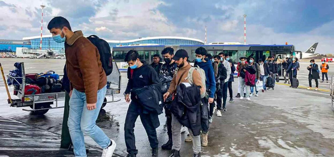 Indian students evacuated from war-zone Ukraine board an airplane to return to India